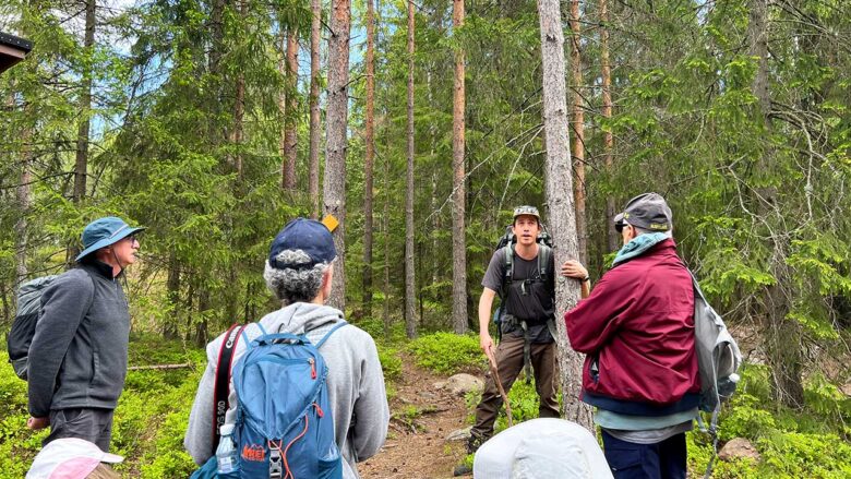 guide and a group of people in a finnish national park