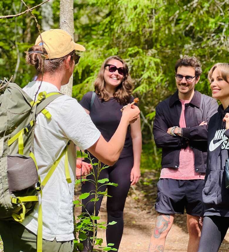 people with guide on a nuuksio national park